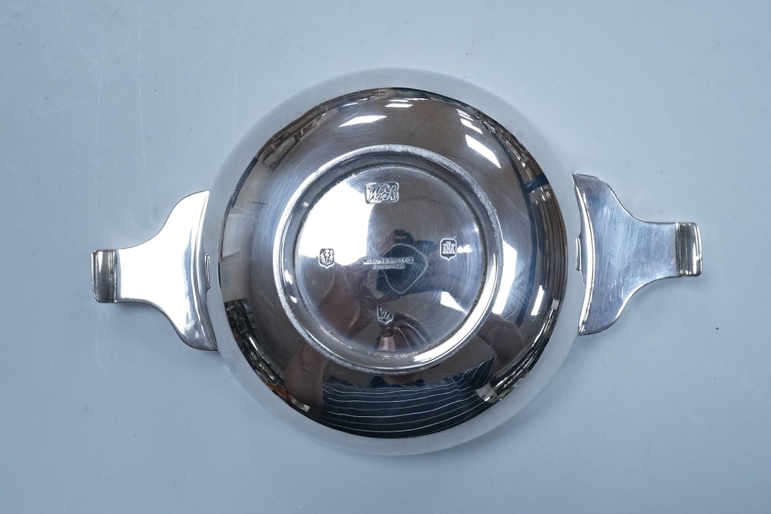 A George V Scottish silver quaich, by Wilson & Sharp, Edinburgh, 1924, 14.4cm over handles, engraved 'Merchant Golf Club, Luffness, 1936', 3.5oz.